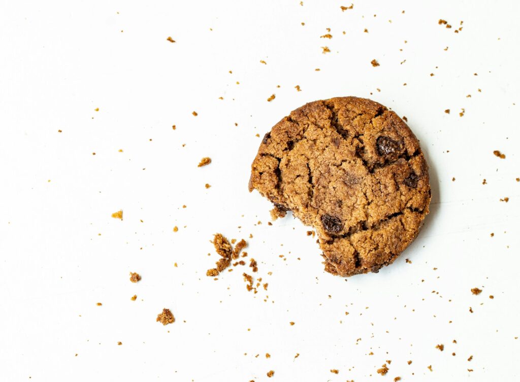 brown round cookie on white surface